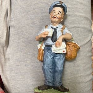 Vintage letter carrier statue